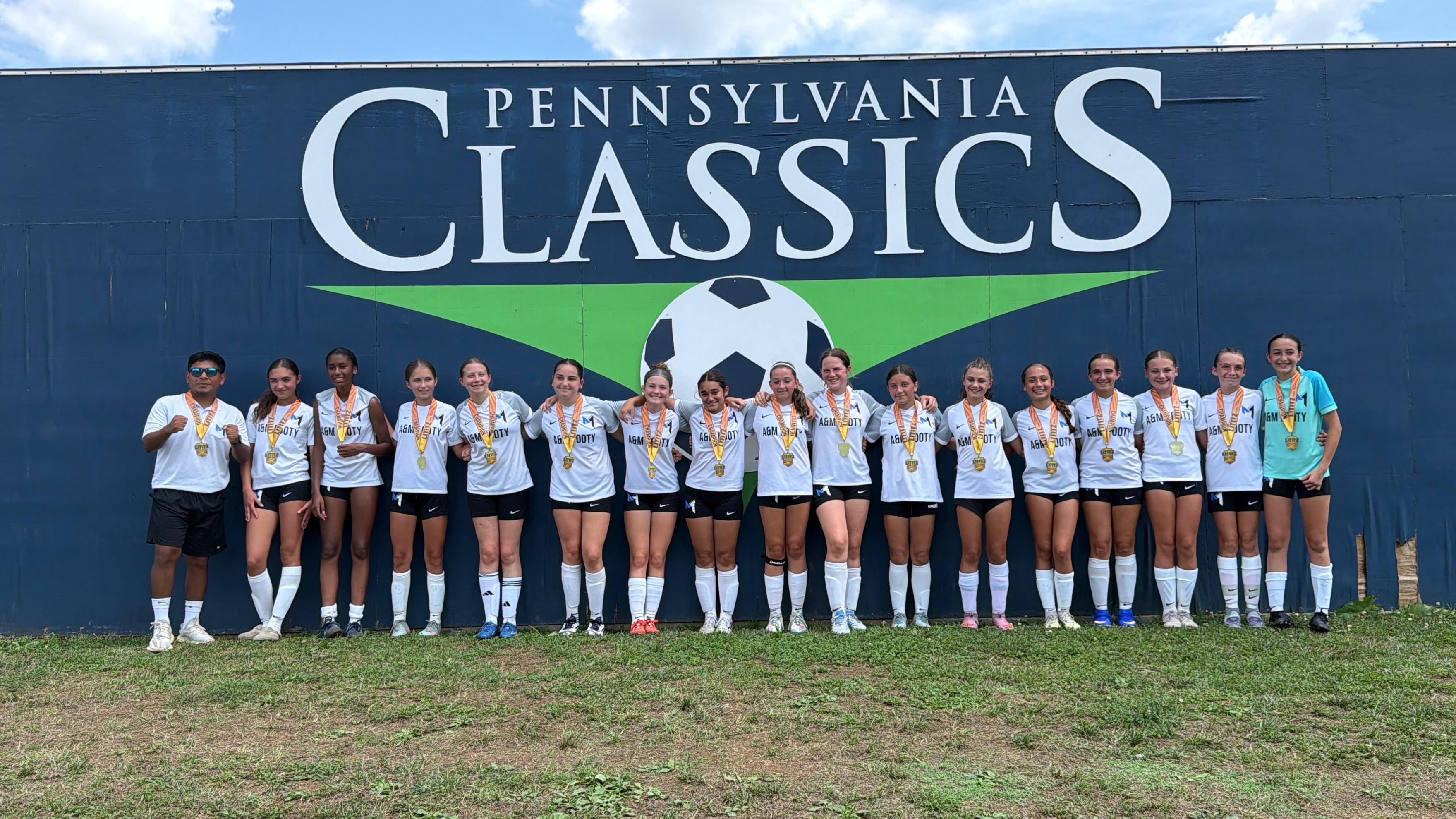 A&M Footy players with medals at Pennsylvania Classics