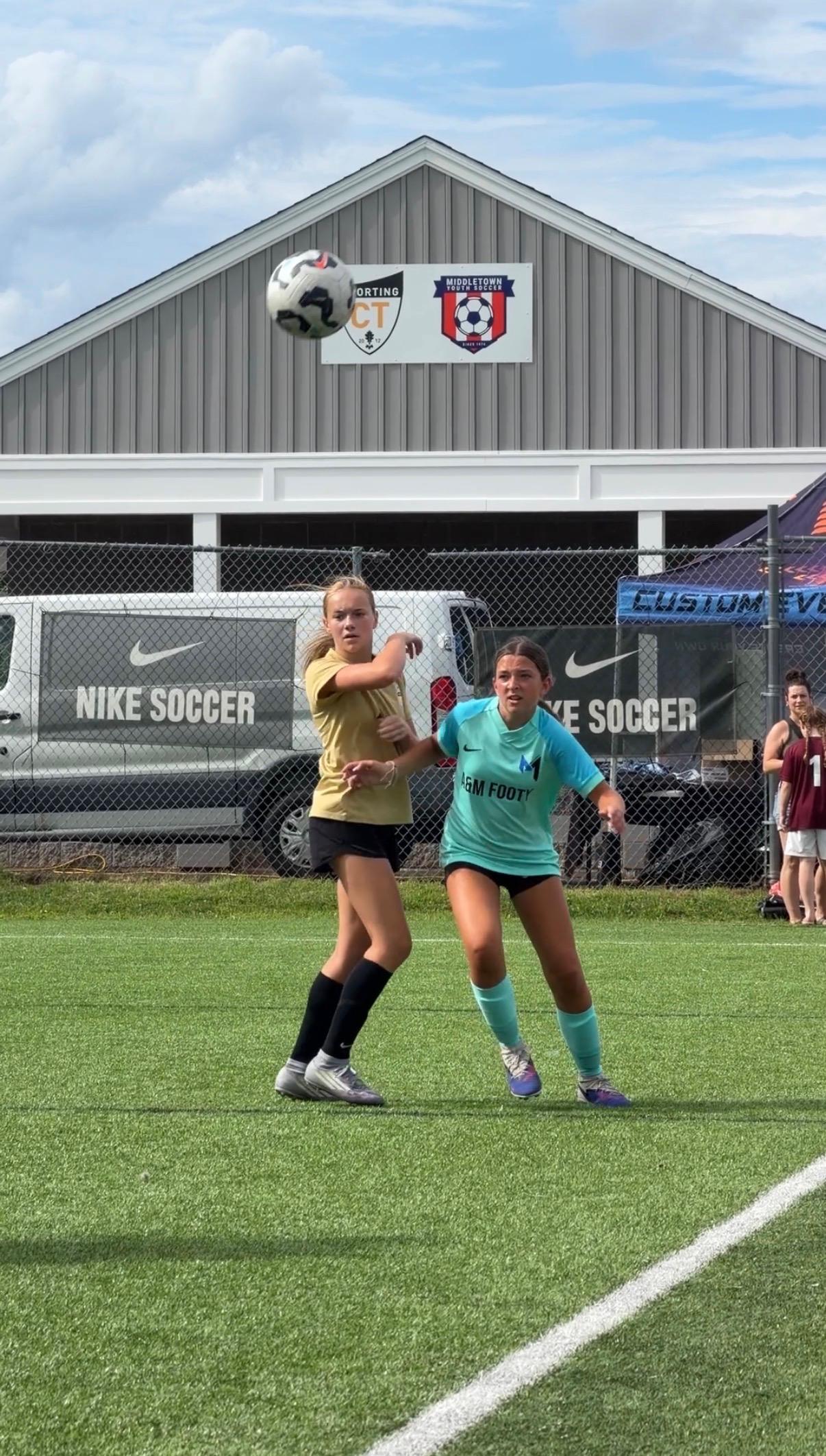 A&M Footy player competing for the ball